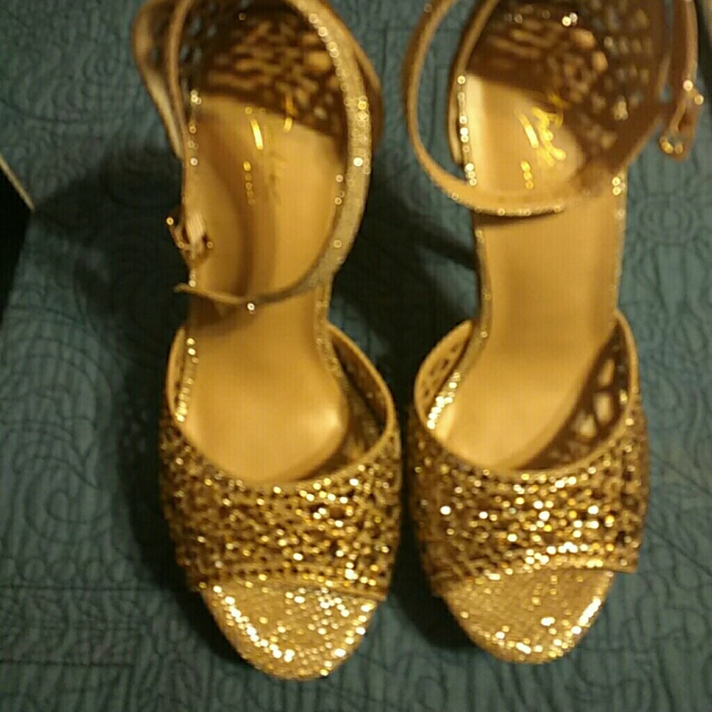 Stilleto heels, ready to party.  Worn once.